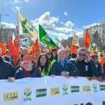 pancarta con donaciano, ana y juan luis